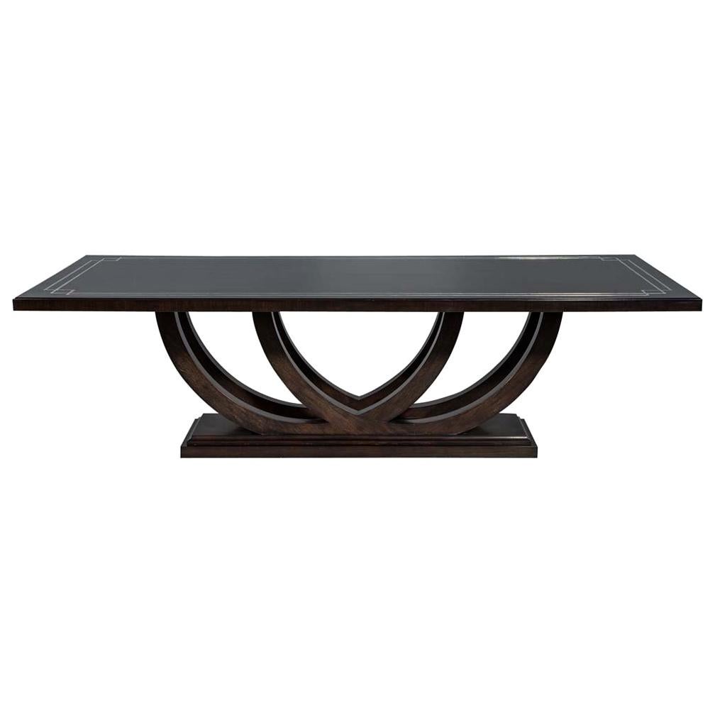 Custom Walnut Dining Table with Polished Metal Inlay Details and Curved Base