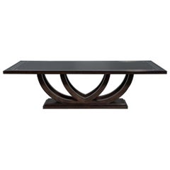 Custom Walnut Dining Table with Polished Metal Inlay Details and Curved Base