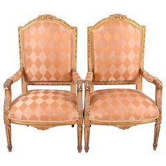 Paire de fauteuils gustaviens dorés