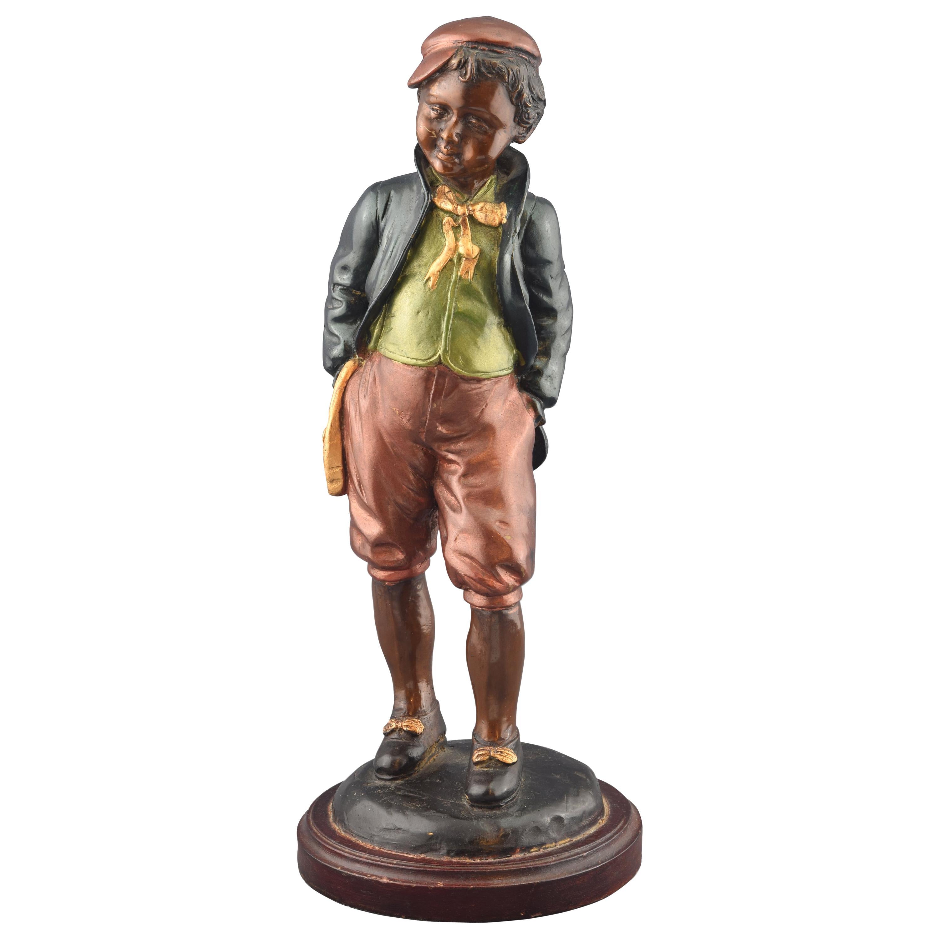 Ragazzo, figura in bronzo policromo