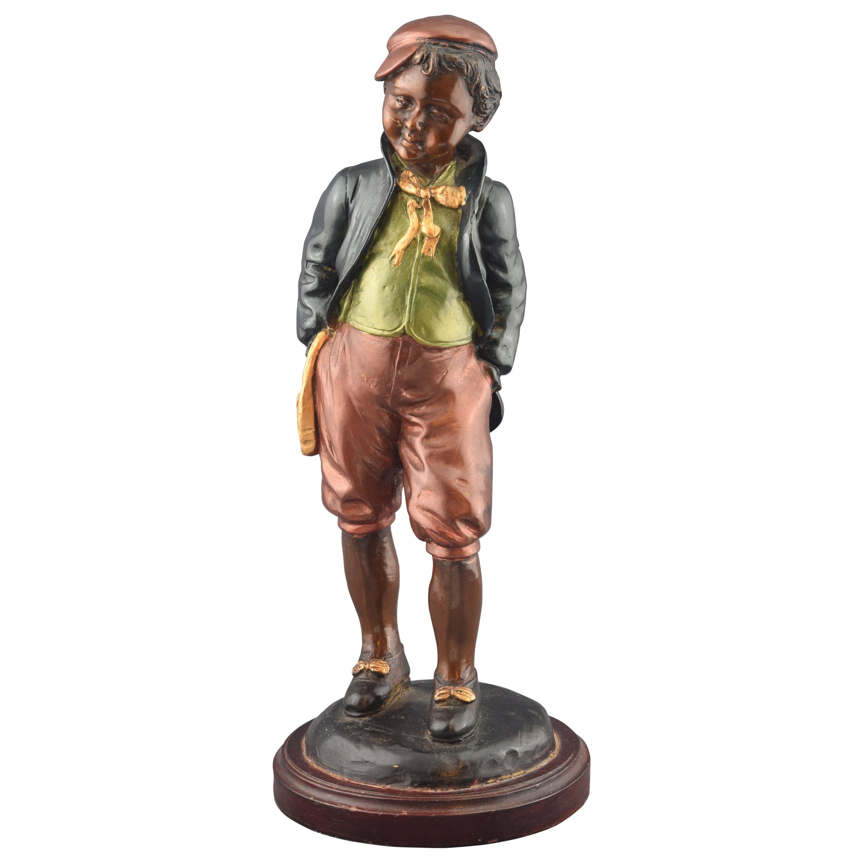 Junger Junge, polychromierte Bronzefigur