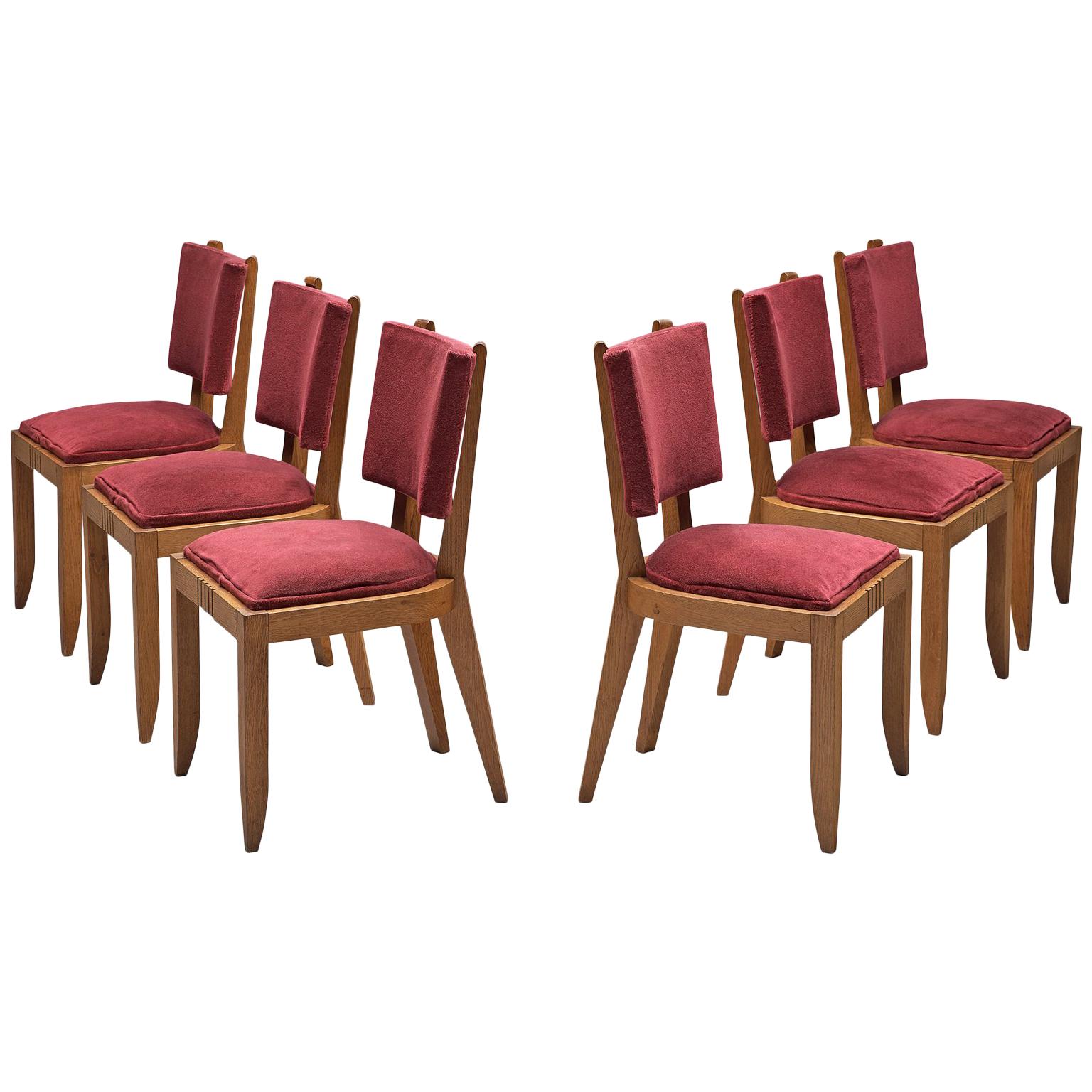 Charles Dudouyt Set of Burgundy Fabric and Oak Dining Chairs