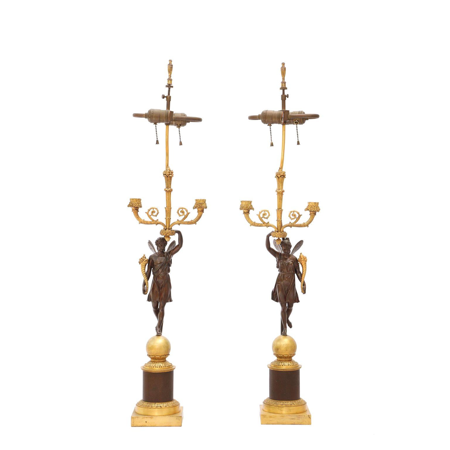 Pair of 19th Century French Ormolu and Patinated Bronze Figural Candelabra Lamps