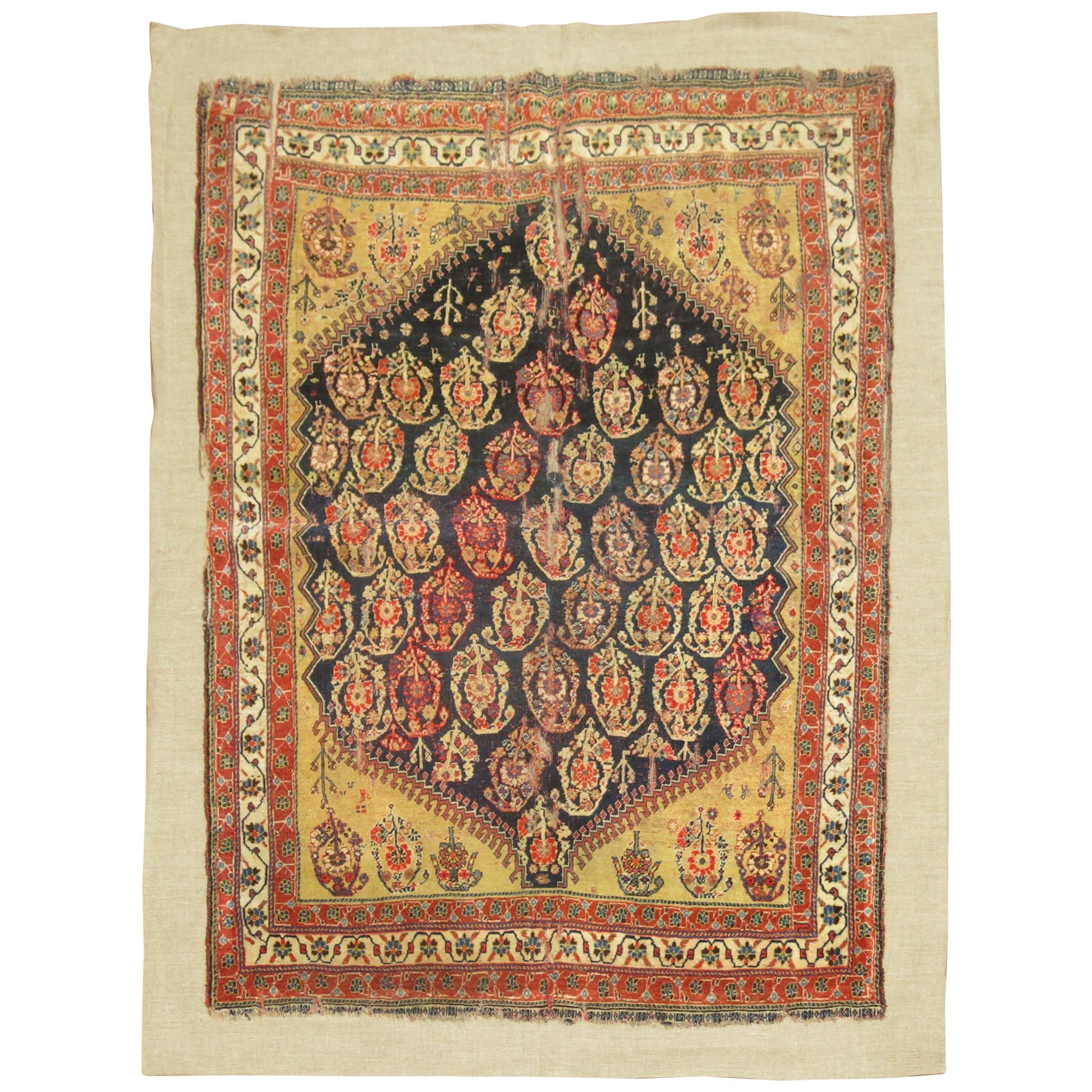 Antique Qashqai Rug Stitched on Linen For Sale