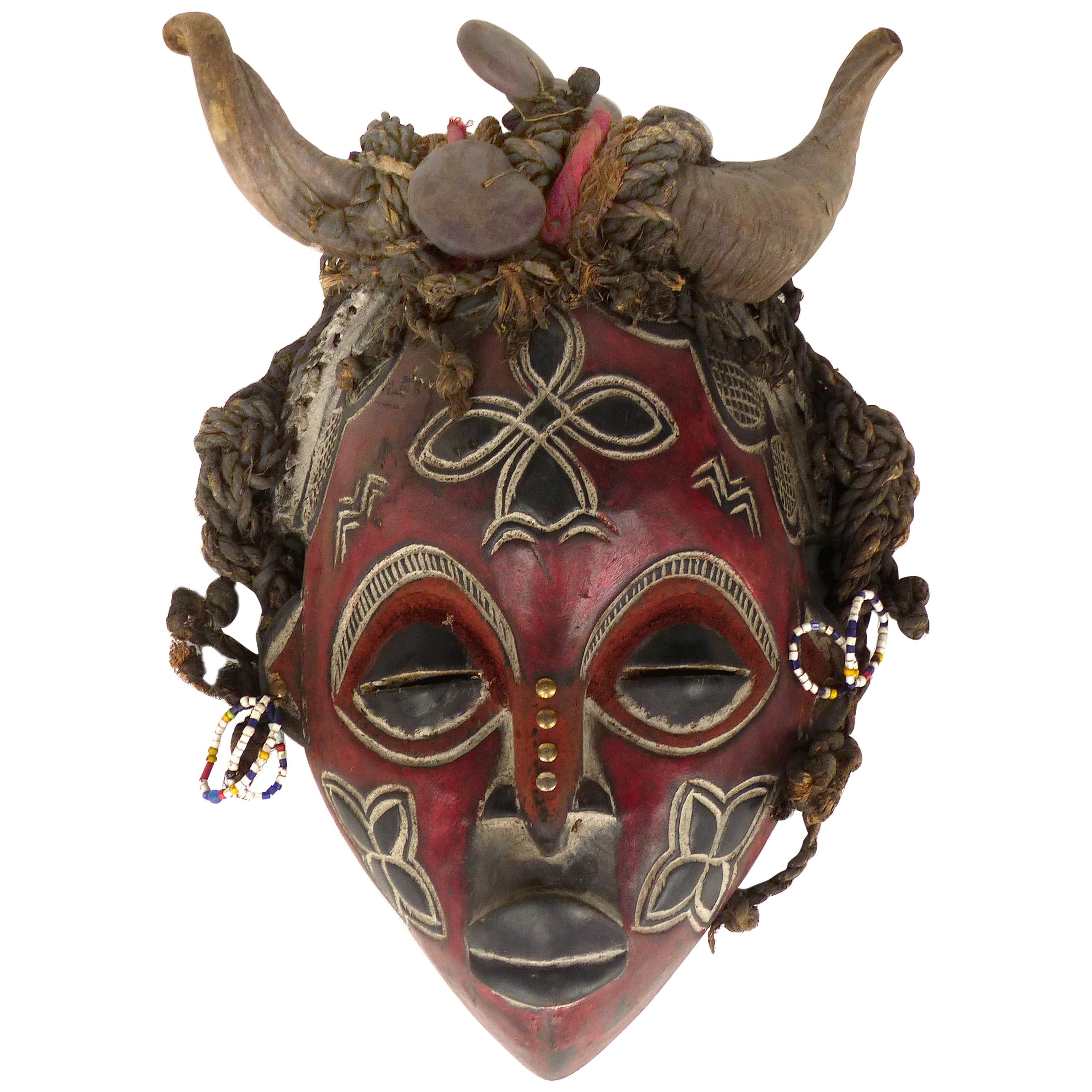Cameroon Bamileke Tribal Carved Horned Mask Embellished with Sea Beans & Beads