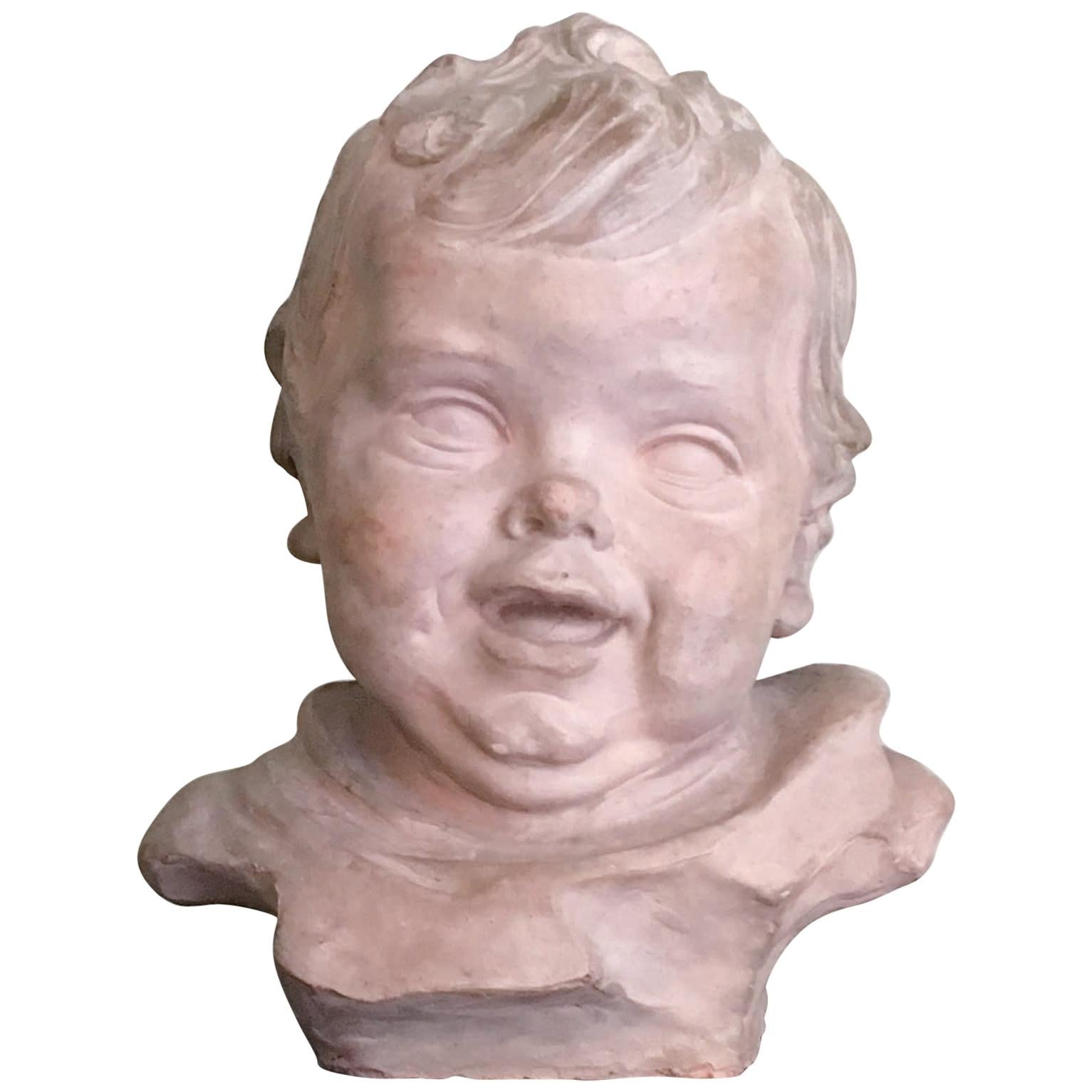 Early 20th Century Italian Terracotta Bust of a Child by Ferrante Zambini For Sale