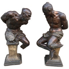 Pair of Plaster Slaves with Bronze Patina, Many Losses and Flaws