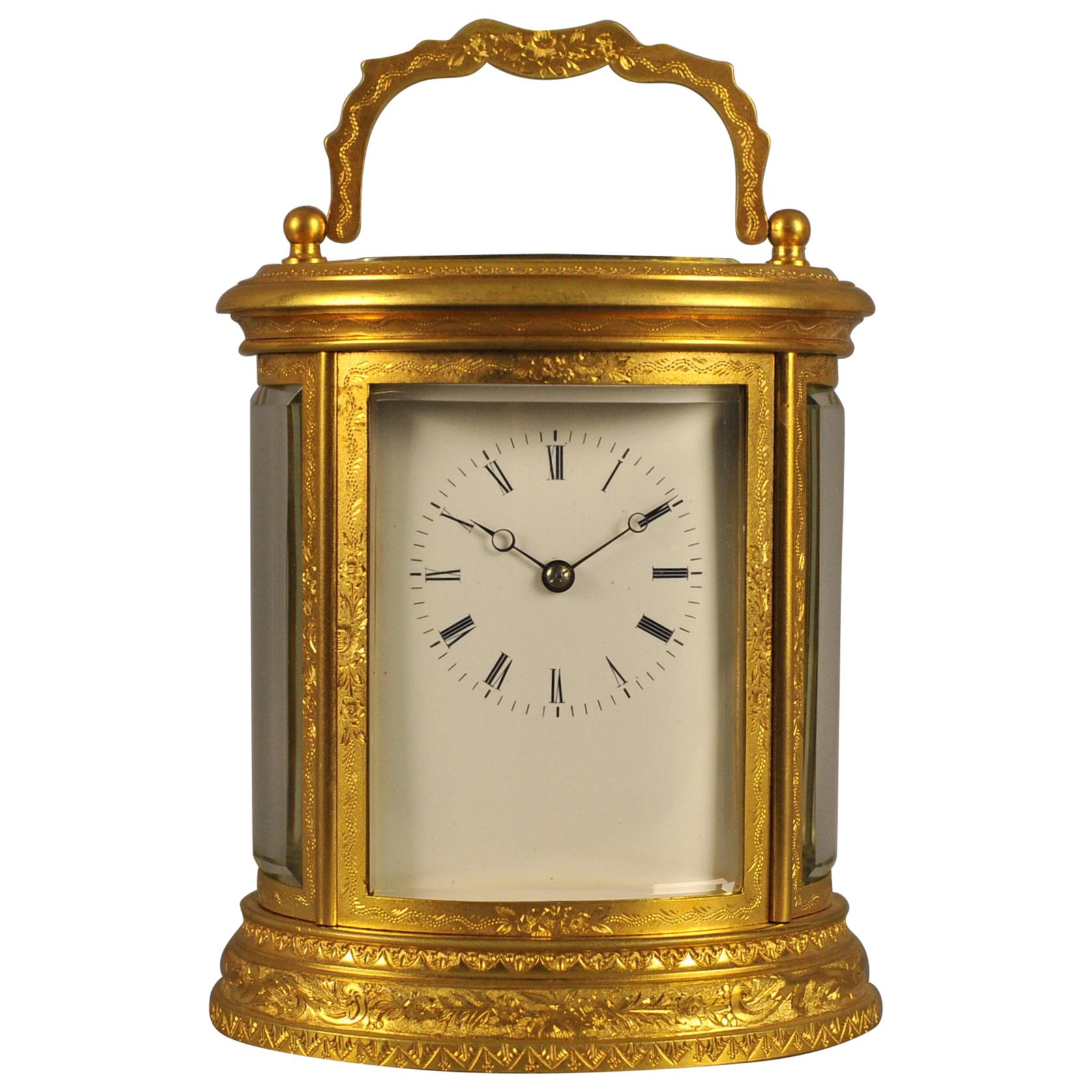 Oval Engraved Bell Striking Carriage Clock with Case For Sale