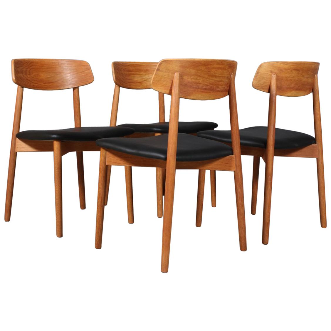 Harry Østergaard, Four Chairs in Oak and Black Leather, 1970s