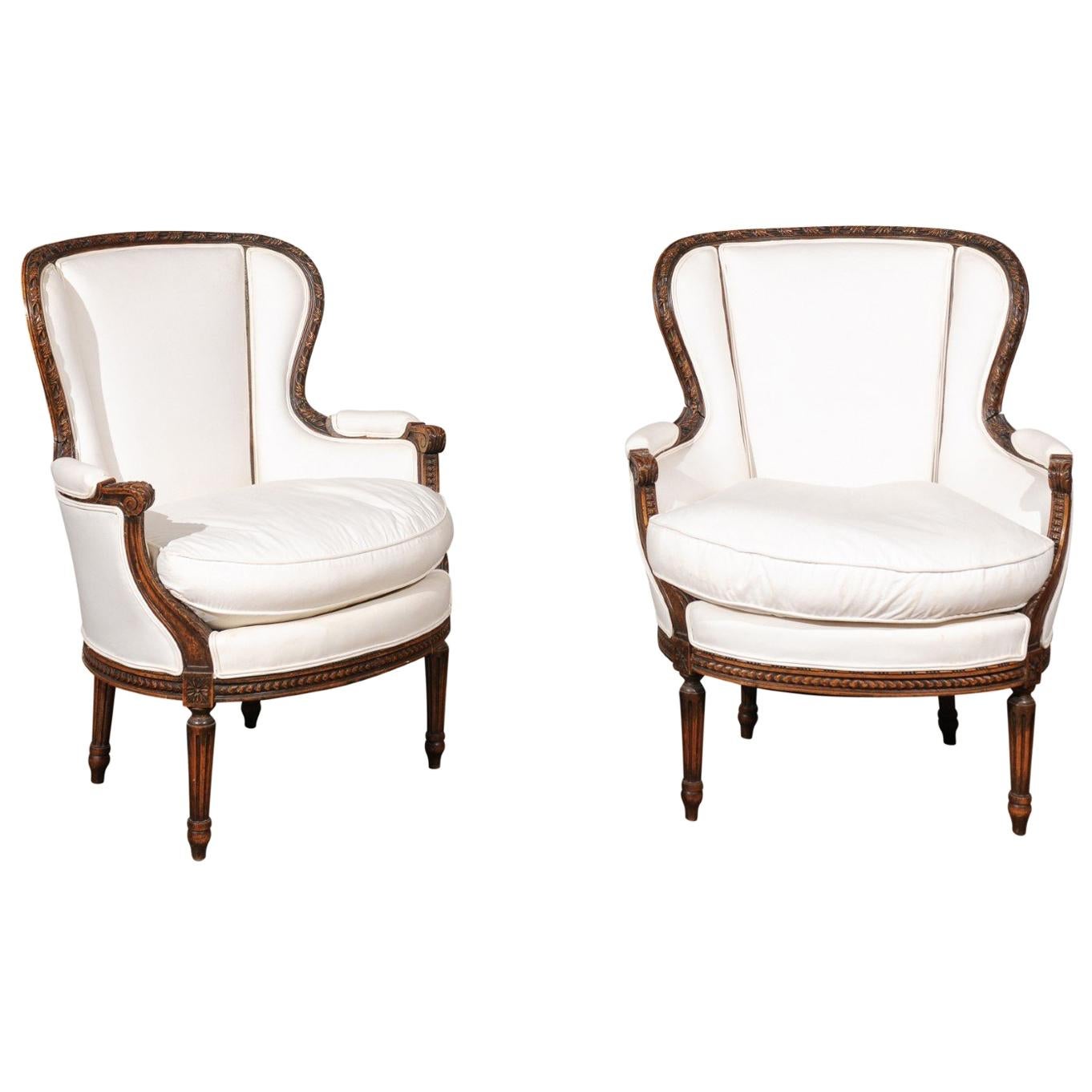 Pair of French Louis XVI Style 19th Century Upholstered Wingback Bergère Chairs