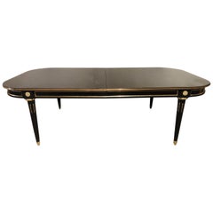 Monumental 1920s Hollywood Regency Ebonized Dining Table by Maison Jansen