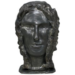 Sculpture en terre cuite à double face de dieux mythologiques romains