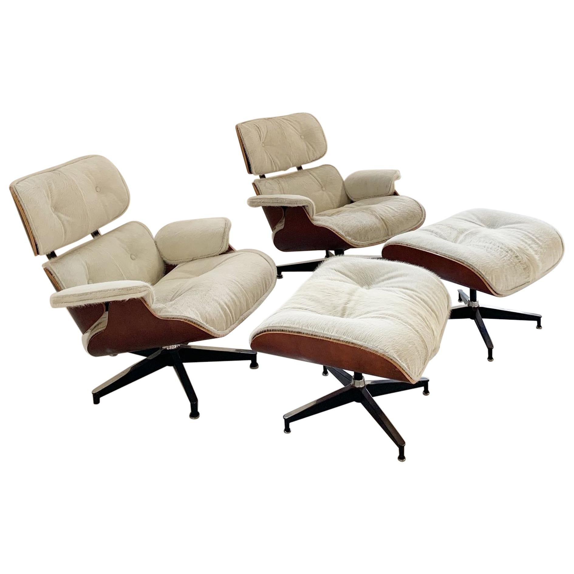 Charles and Ray Eames for Herman Miller Chairs and Ottomans Restored in Cowhide