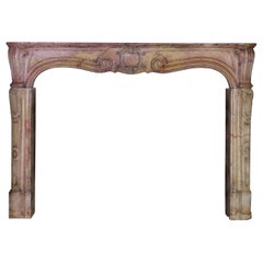 18th Century French Antique Fireplace Surround in Stone Out of a Panel Room