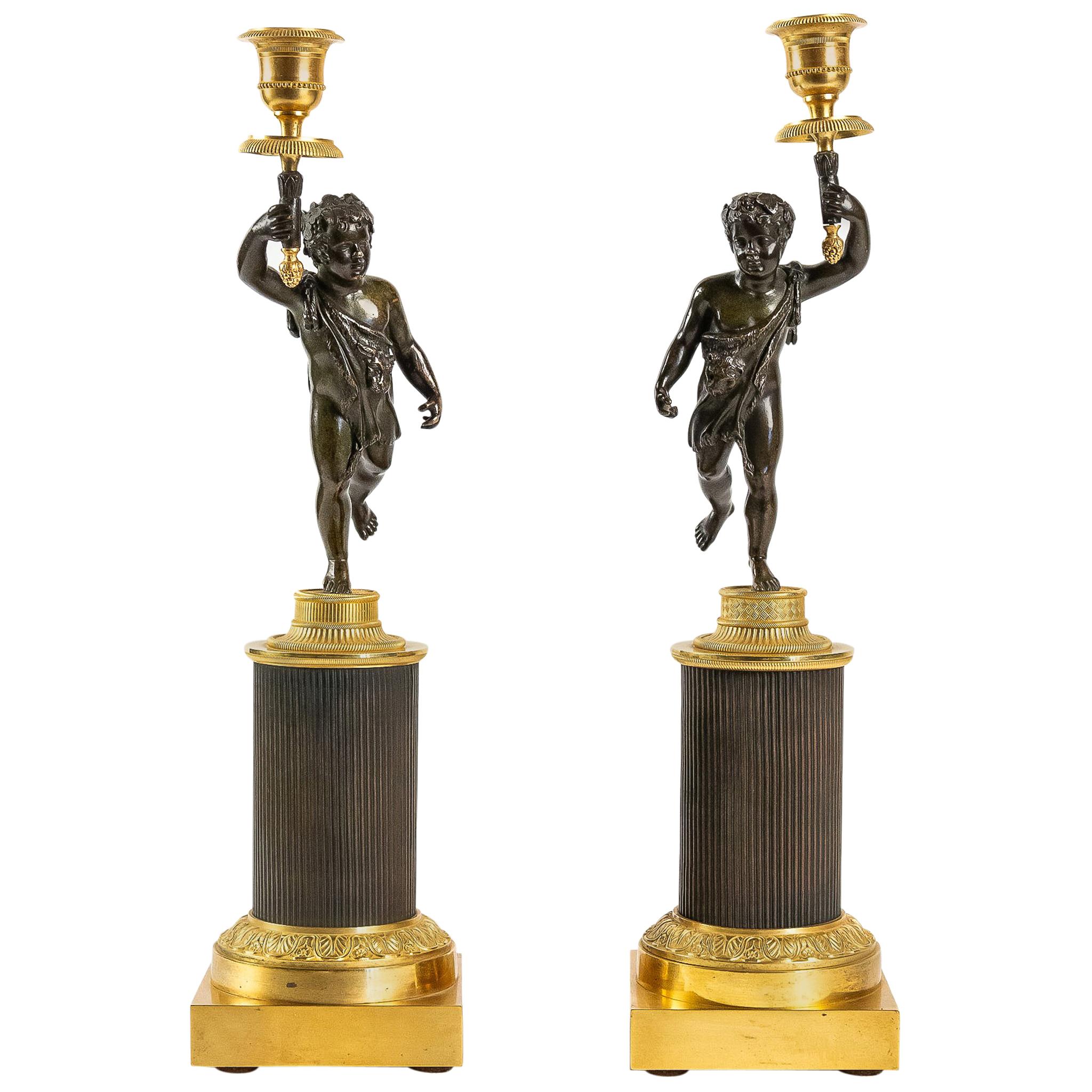 French Louis XVI Style, Pair of Patinated and Gilded Candlesticks, circa 1880 For Sale