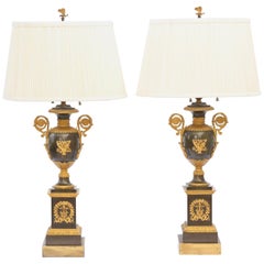 Paire de lampes en bronze patiné et bronze doré du début du 19e siècle