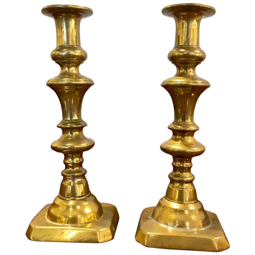 Pair of English 19th Century Brass Push-Up Candlesticks