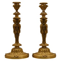 One Pair of Restauration Ormolu Candlesticks