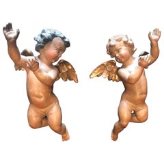 Antique 19th Century Pair of Carved and Polychrome Wood Putti Sculptures