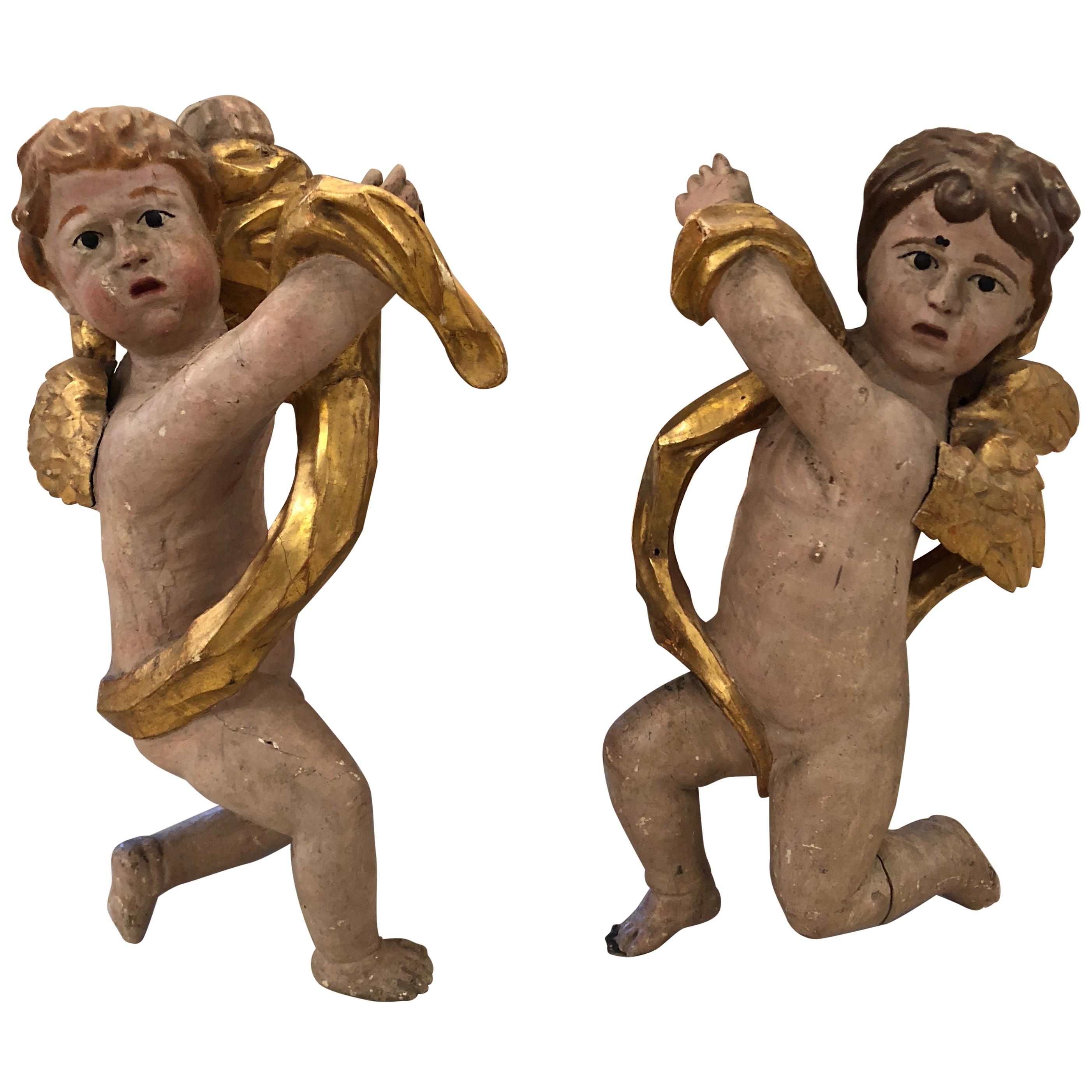 Pair of Antique Carved Wood and Gilded Cherub Sculptures