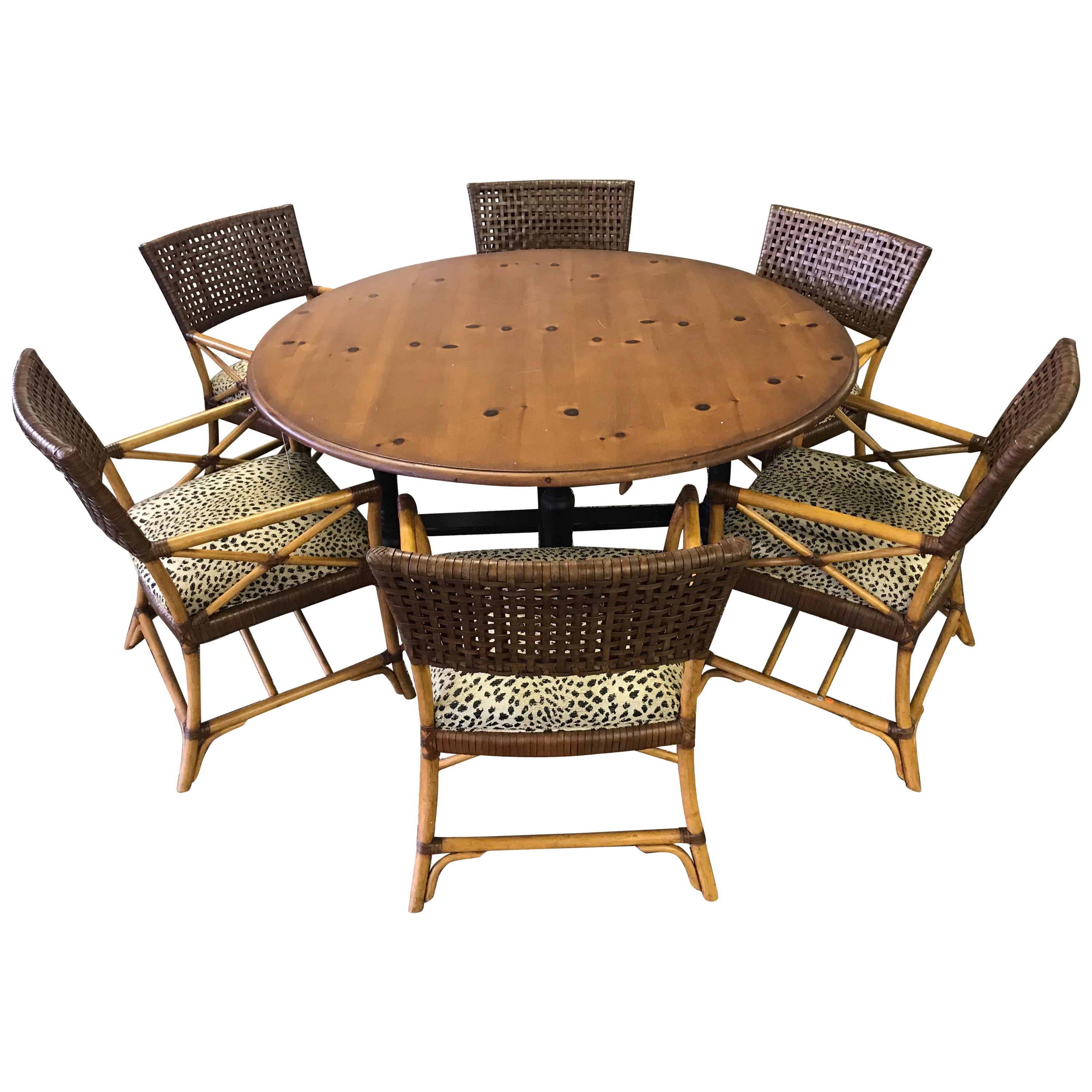 Woven Leather and Bamboo Dining Chairs with Round Wood Table
