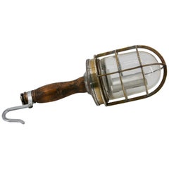 Industrial Task Light with a Steel Cage, a Wood Handle and a Steel Hook