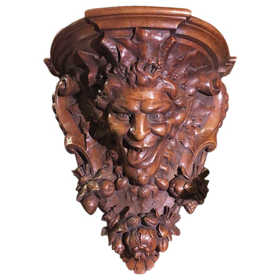 Late 19th Century Italian Hand Carved Walnut Shelf Depicting a Capricious Satyr For Sale