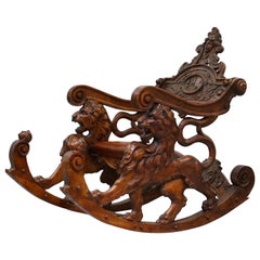 Fauteuil à bascule italien vers 1850 en bois fruitier:: restauré et sculpté à la main:: Lion & Chérubin