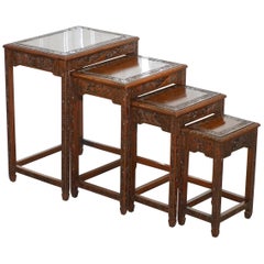 Vintage Chinese Export circa 1930s Nest of Four Tables Heavily Carved All over in Teak