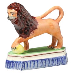 Staffordshire Pottery Figure of a Lion with a Pearlware Glaze Early 19th Century