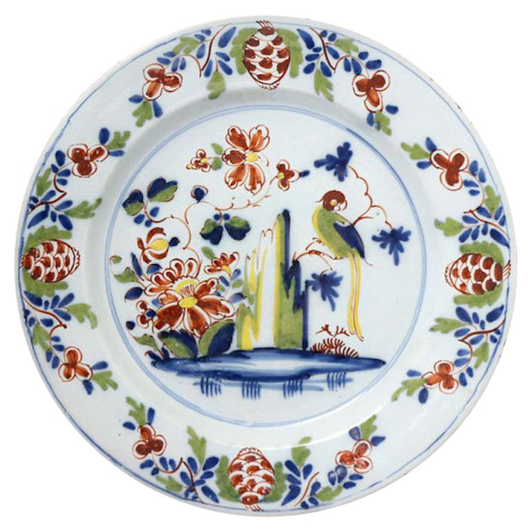 English Delftware Chargers with Parrot, Flowers Rock in Polychrome For Sale