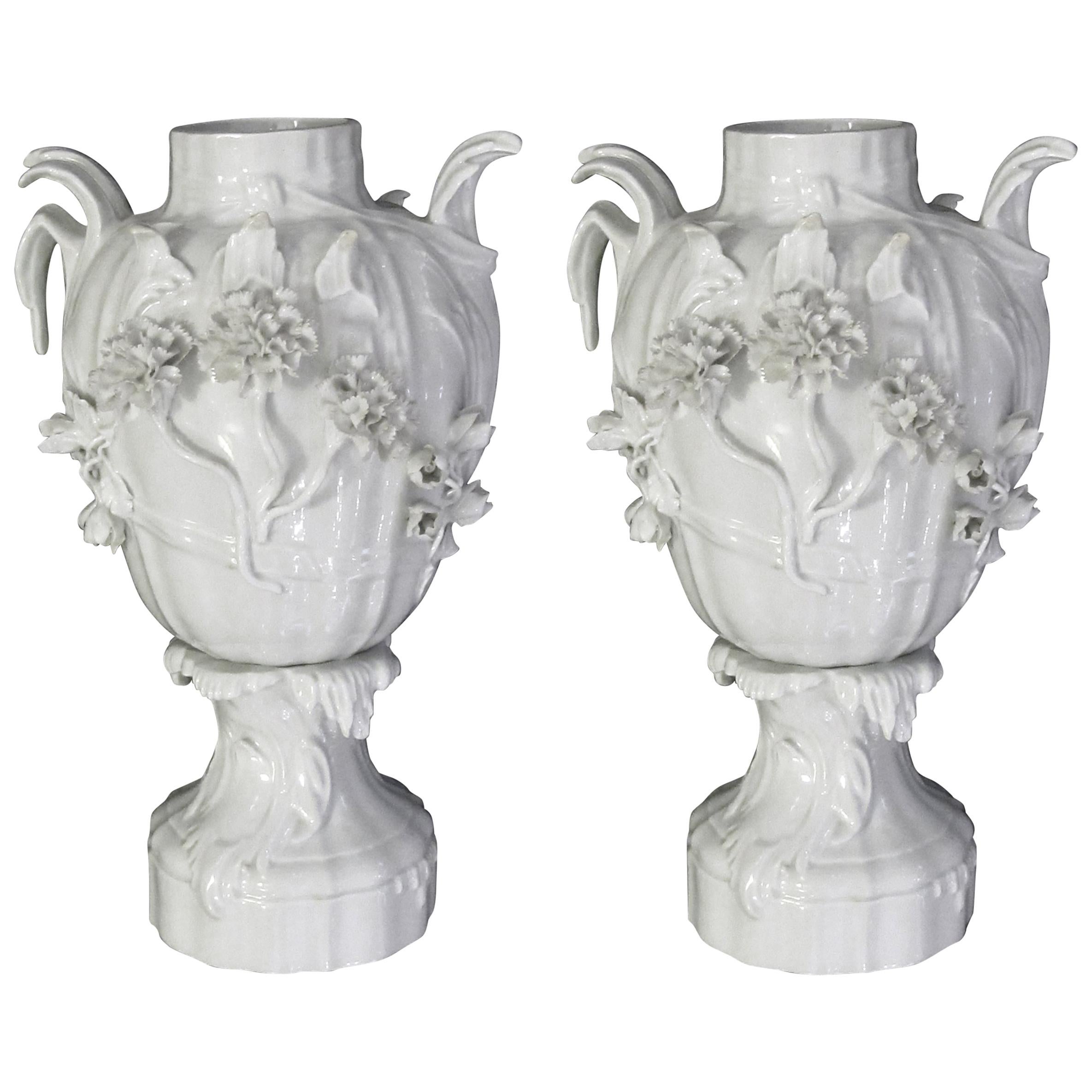 Finely Rendered Pair of French Rococo Style Blanc-de-chine Urns or Vases