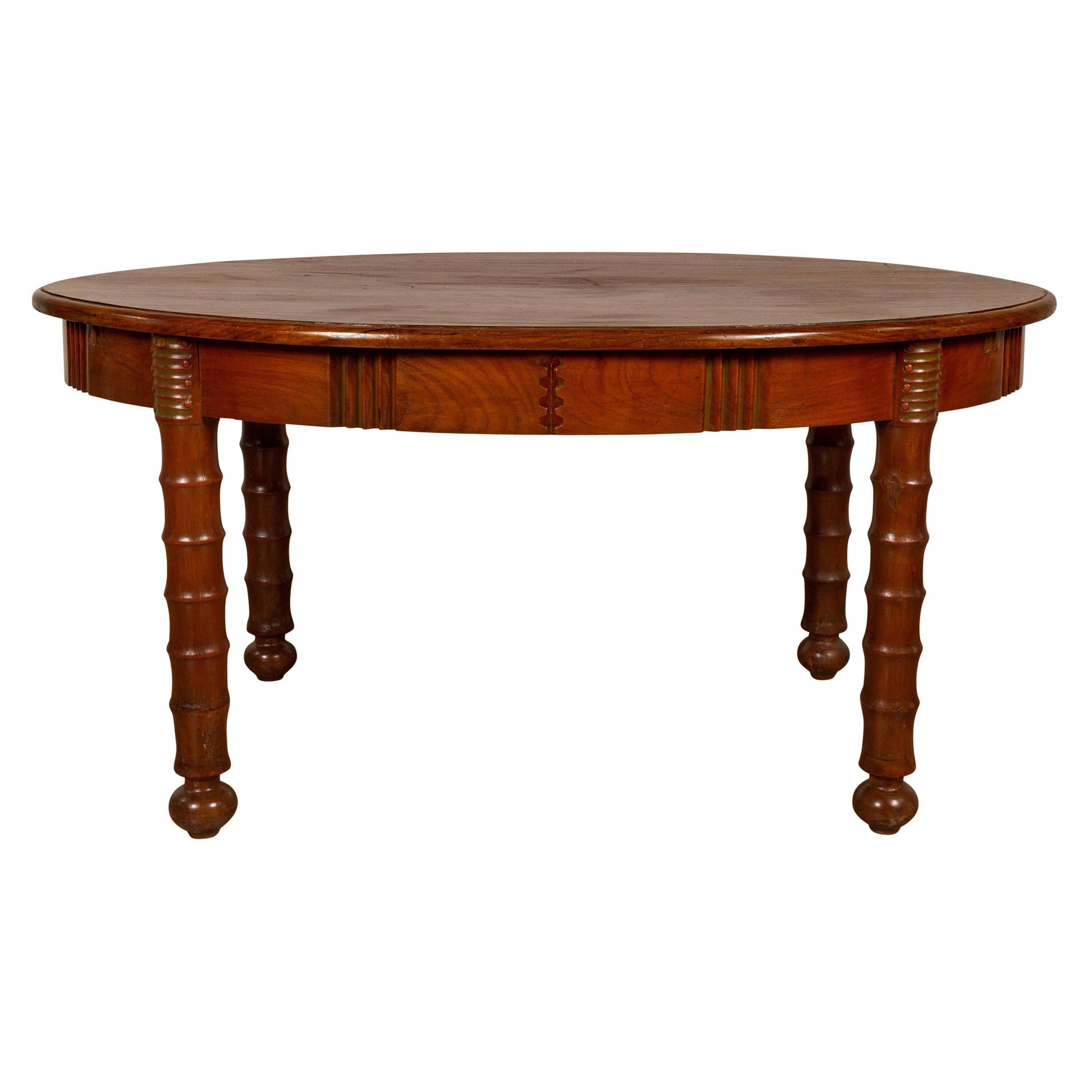 Antique Oval Dining Room Table from Indonesia with Spindle Legs and Warm Patina