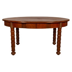 Antique Oval Dining Room Table from Indonesia with Spindle Legs and Warm Patina