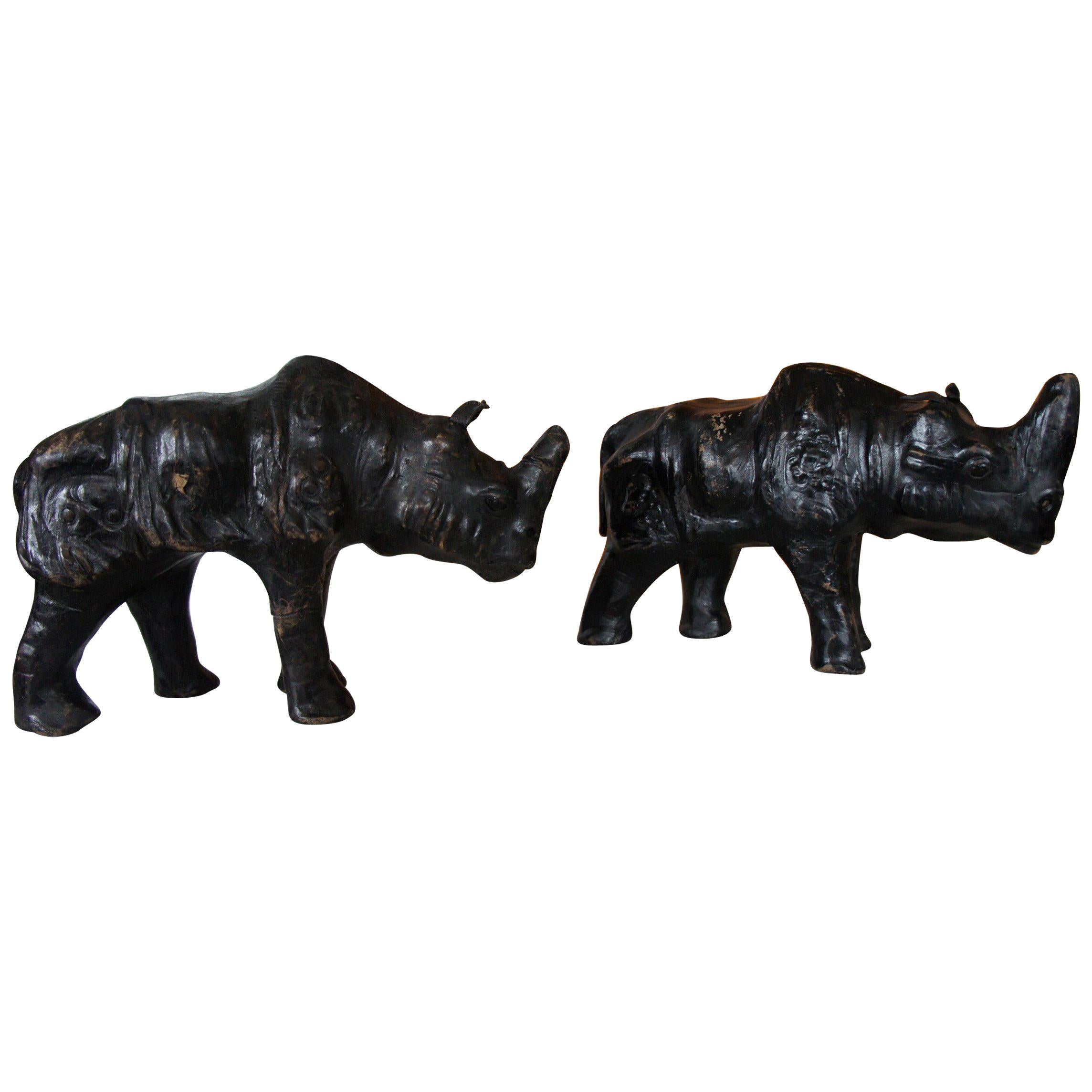 Rare and Small Pair of Black Rhino Sculptures Leather on Wood with Glass Eyes For Sale