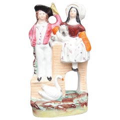 Staffordshire Figure of a Man, Woman and Swan