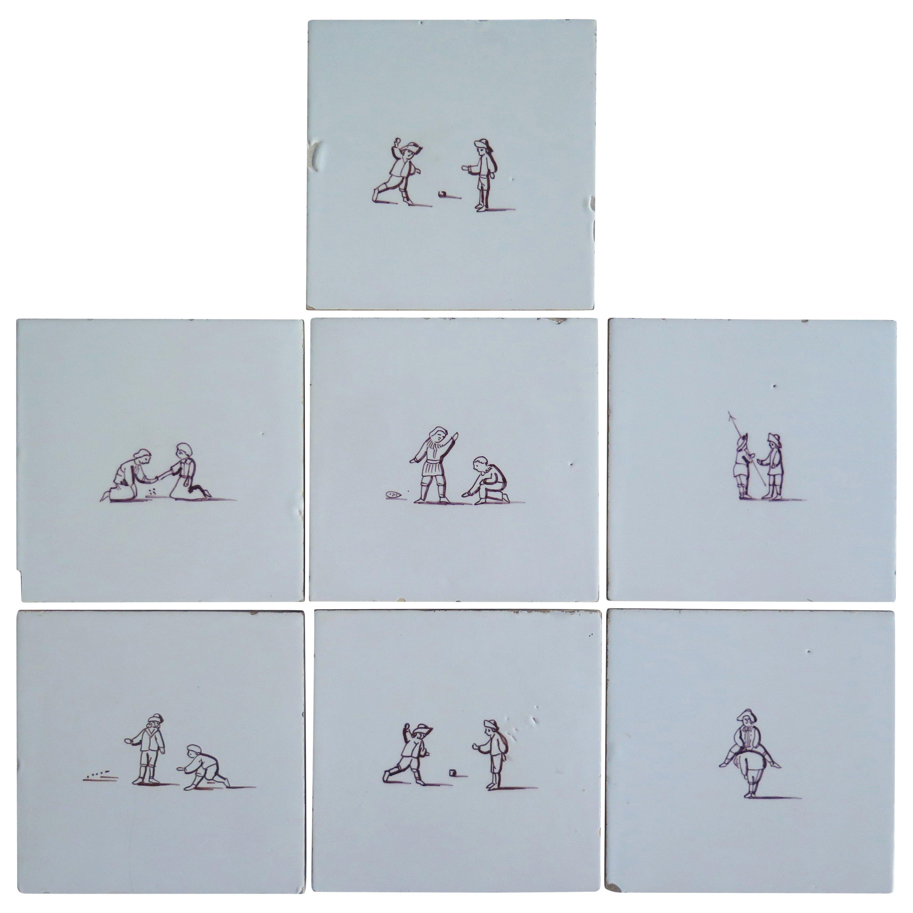 Seven Delft Ceramic Manganese Wall Tiles Hand painted Children's Games
