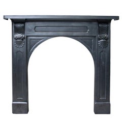 Antique Mid-Victorian Cast Iron Fireplace with Arched Aperture