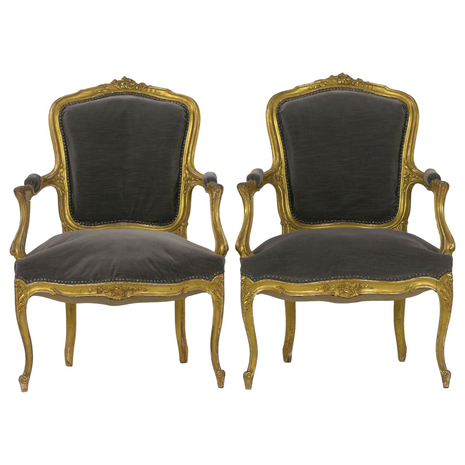 Pair of French Louis XV Style Carved Giltwood Antique Armchairs, circa 1900