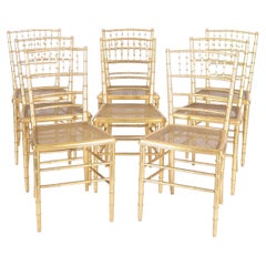 Hollywood Regency Chiavari Style Chairs in Giltwood with Caned Seats