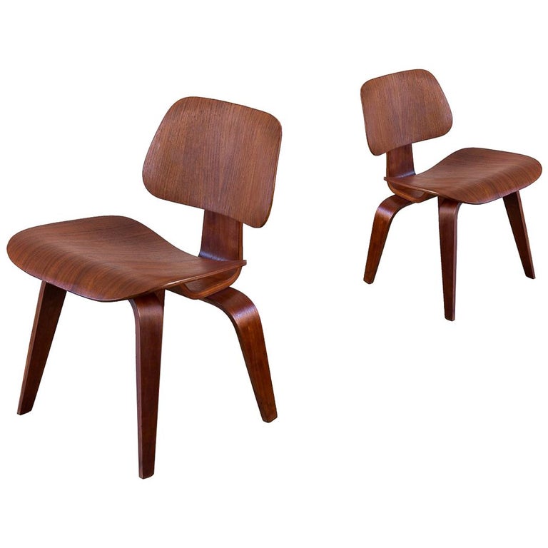 Pair of Early Walnut Eames DCWs Dining Chair Wood for Herman Miller For