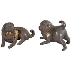 Paar japanische spielerische Puppiche aus Bronze des 19. Jahrhunderts