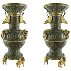 Pair of Chinese Bronze Vases with Parcel-Gilt Features