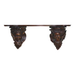 Carved Shelf with Cherub Faces