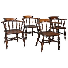 Set of Four Mid-19th Century Beech & Elm Smokers Bow Windsor or Captains Chairs 