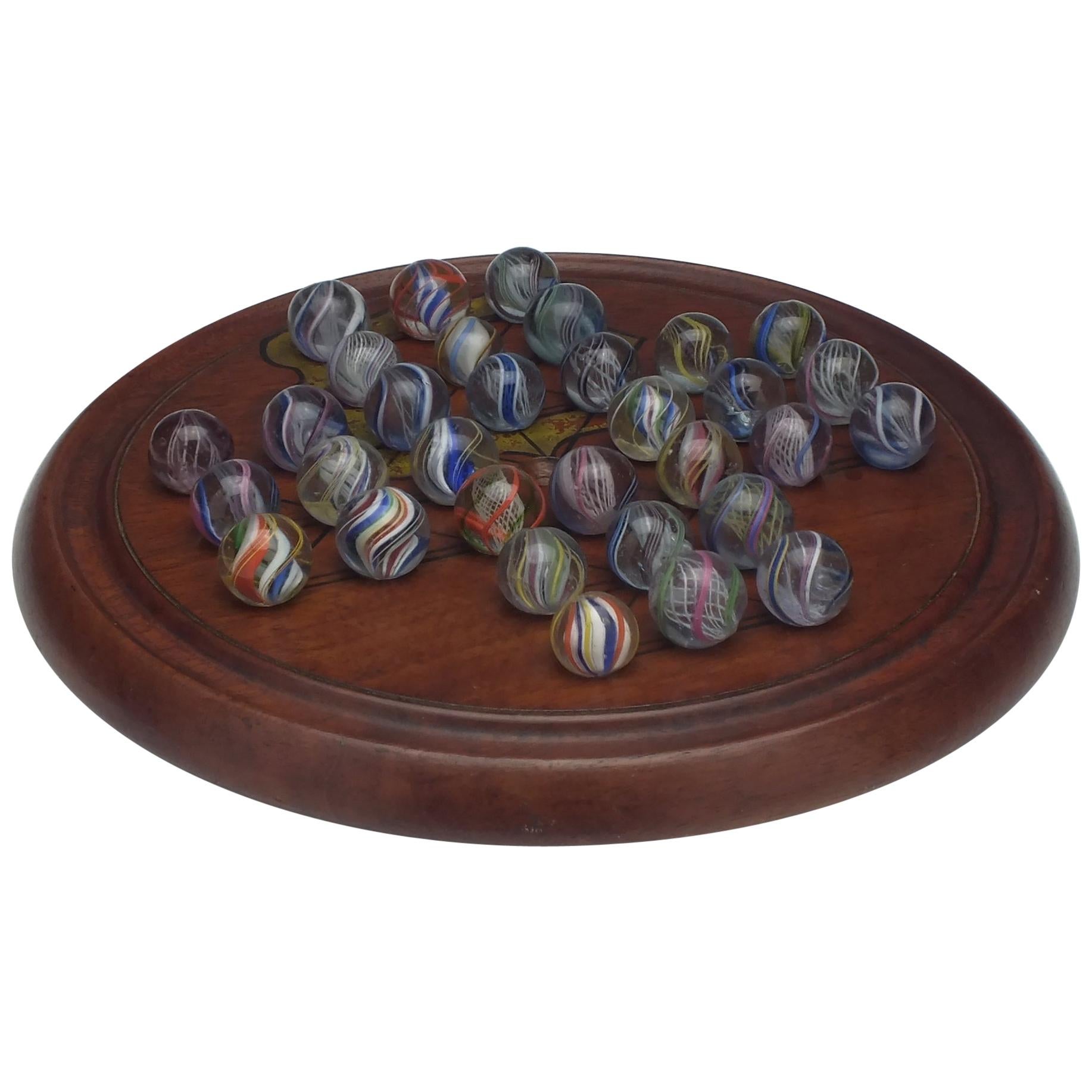 Antique Solitaire Board and 19th Century German Marbles, circa 1870