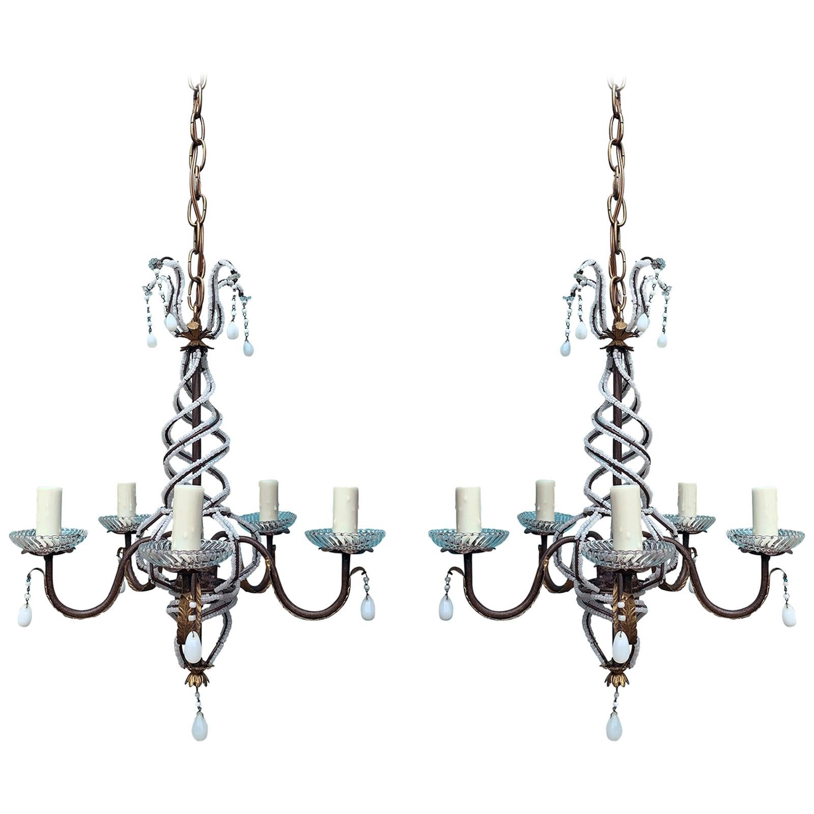 Pair of Mid-20th Century Iron and White Beaded Chandeliers, Gilt Leaf Accents
