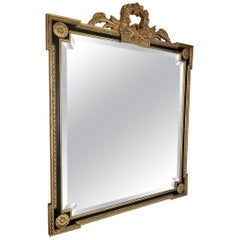 Louis XVI Style Giltwood and Ebony Beveled Glass Mirror