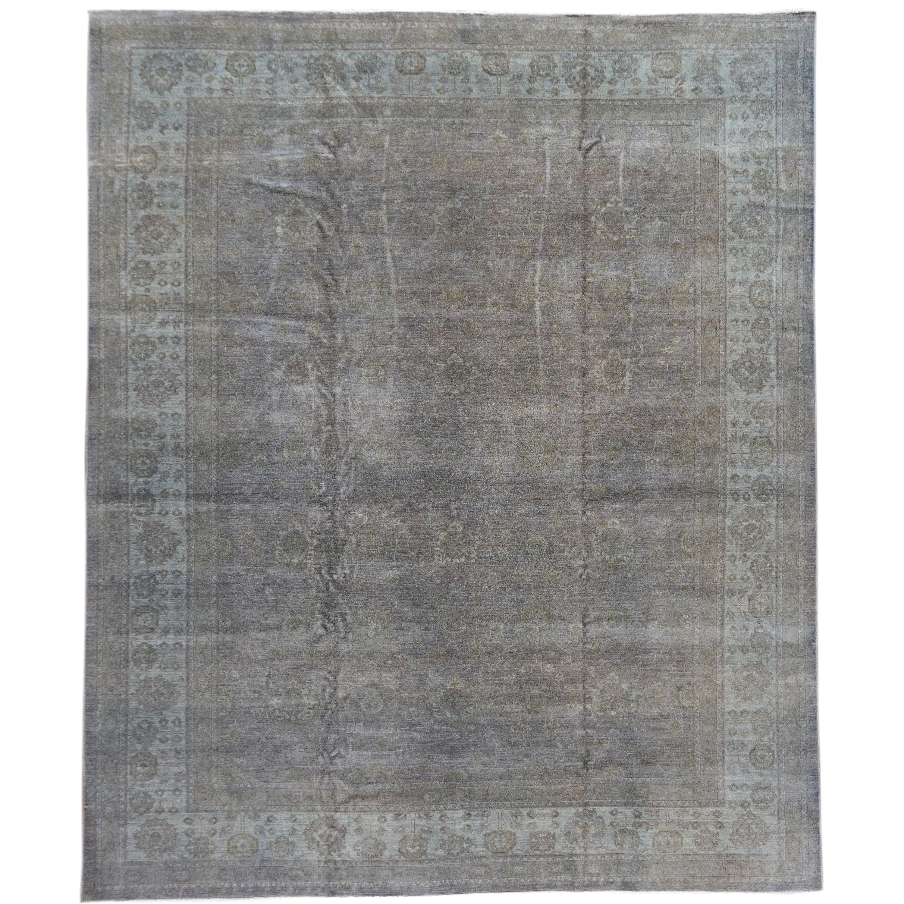 Contemporary gray overdyed wool room-size rug.