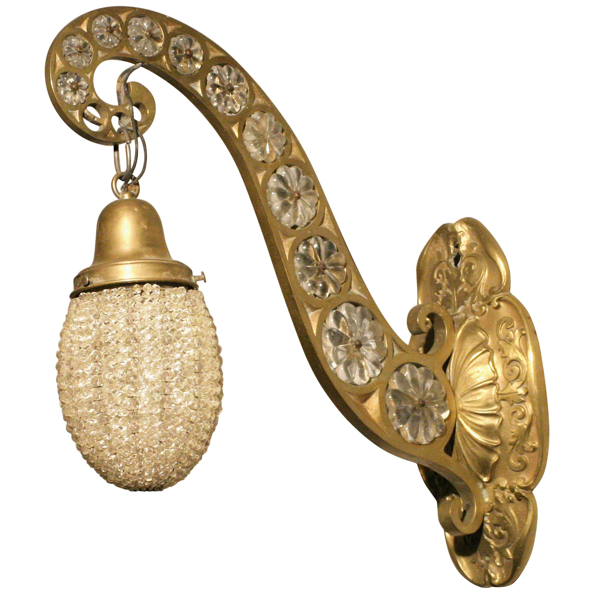 Hollywood Regency Brass and Crystal Sconce For Sale